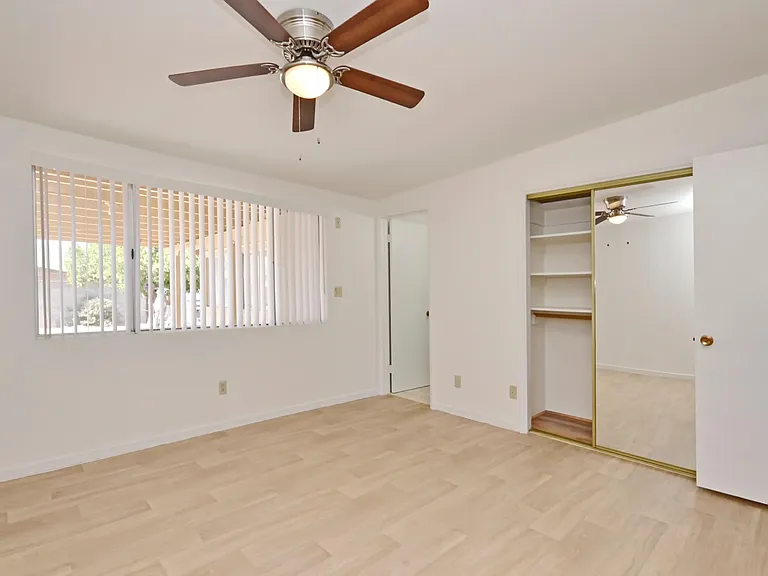 Master bedroom with view to backyard