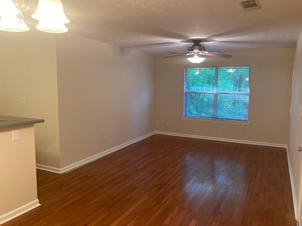 Open kitchen, dining, and living area.