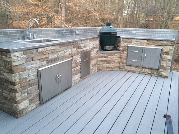 Deck with build in kitchen area.