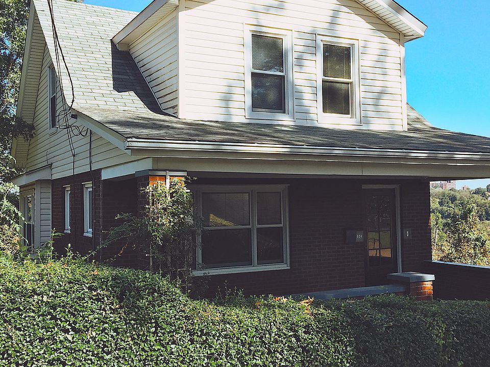 Large front porch on a quiet street.