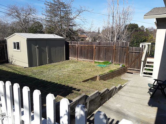 Side yard w/storage shed