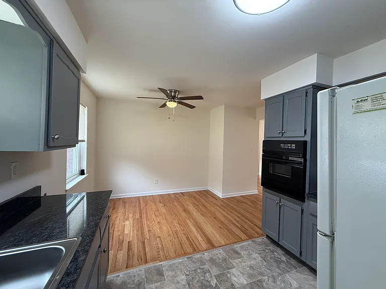 2nd view of Kitchen to Dining Area with Hard Wood Floors