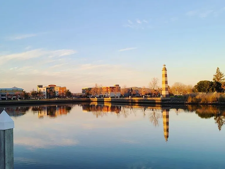 Stunning waterfront only one block away. Enjoy relaxing evening strolls with the pups or kids. Easy walk to restaurants. No need to drive!