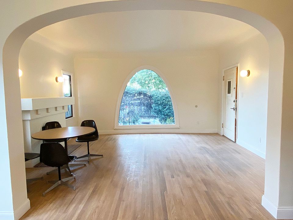 Ample Spanish style details accentuate the iconic curved window