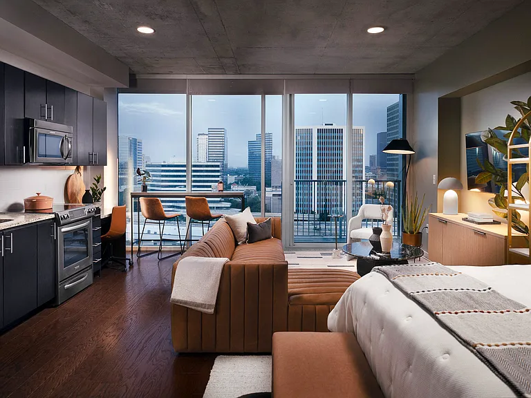 Floor-to-ceiling windows with solar shades