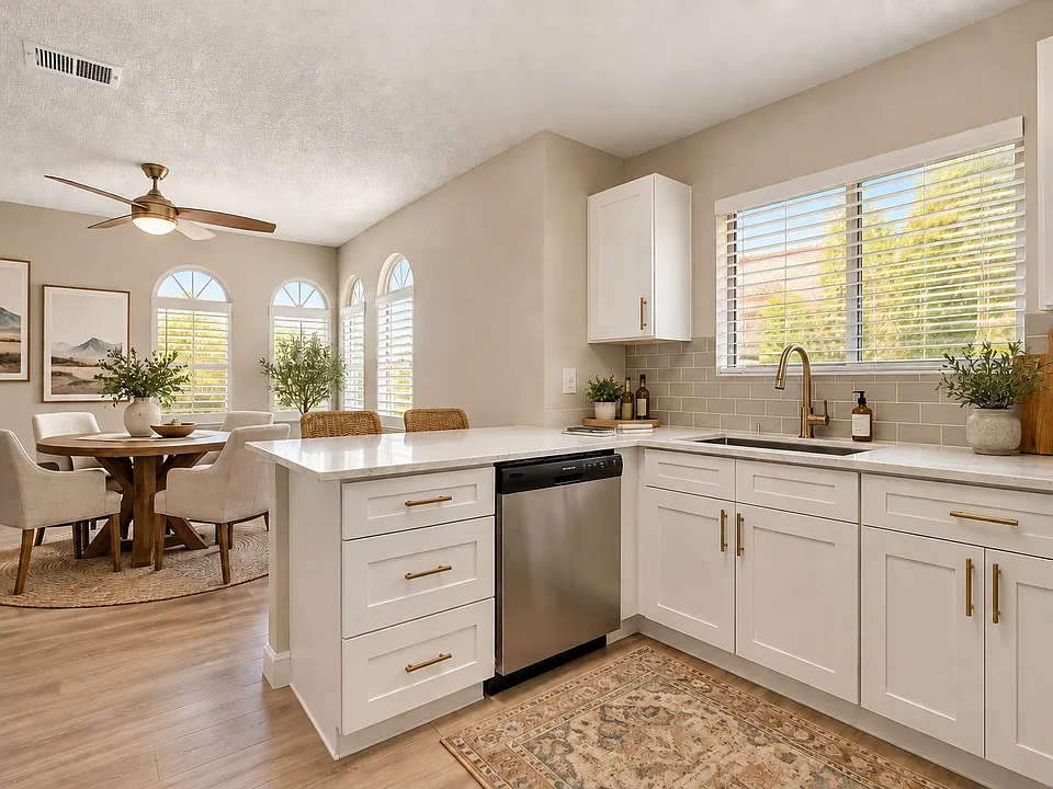 Elevate your lifestyle at Breakers with this beautifully designed kitchen featuring modern appliances, ample storage, and an inviting breakfast bar. Perfect for culinary creations and gatherings. Schedule a tour today to see more!