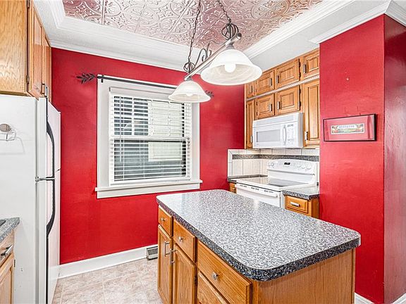 5th image of 5729 Holmes St