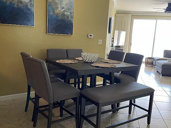 Dining room table seats eight.