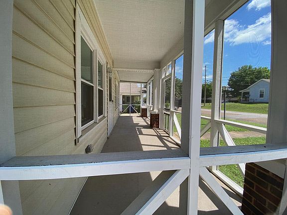 Handcrafted very large screened in porch.
