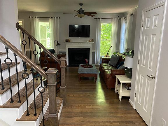 View of foyer and living room when walking in through front door.