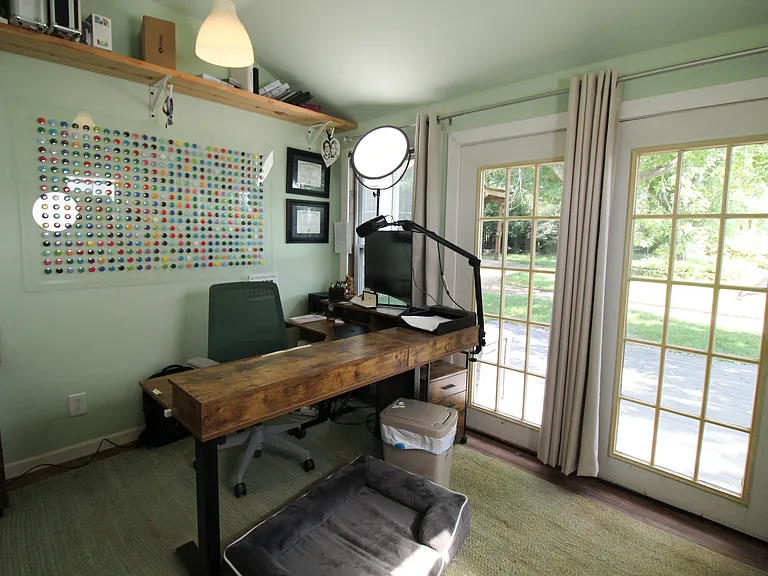 1401 NE Dysart Woods Ln — Photo 45
