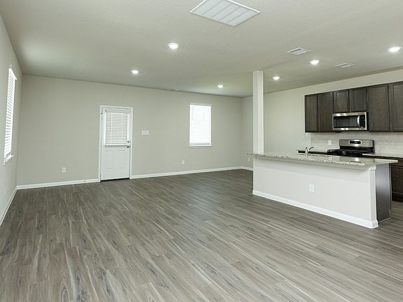 Family Room to Kitchen and Dining Area