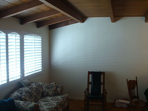 Front family room with wood beam ceilings