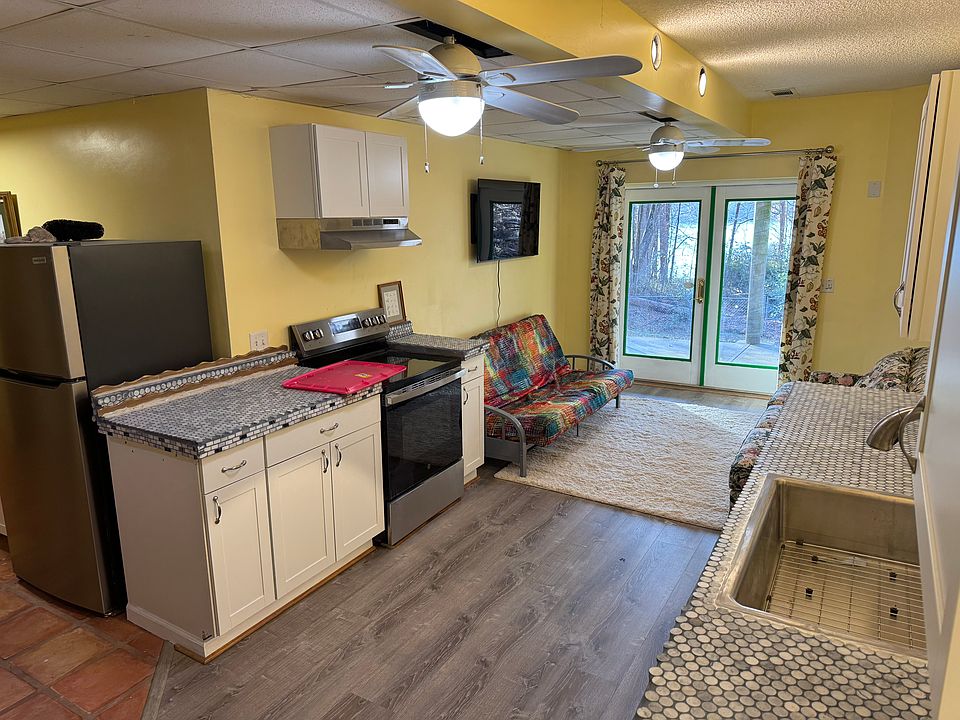 Dining prep and seating area with flatscreen smart TV