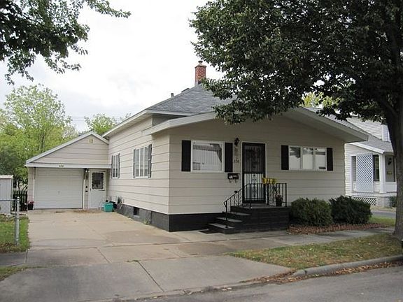 1 car garage with storage shed