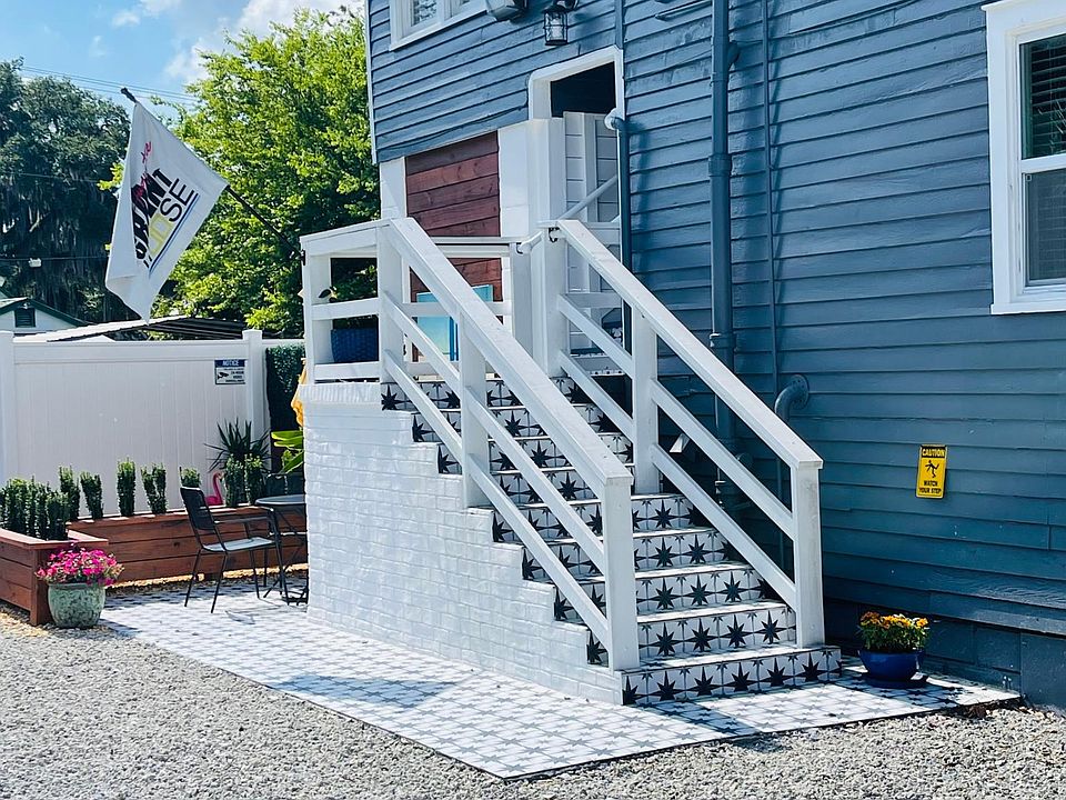 Unit entrance with outdoor patio space