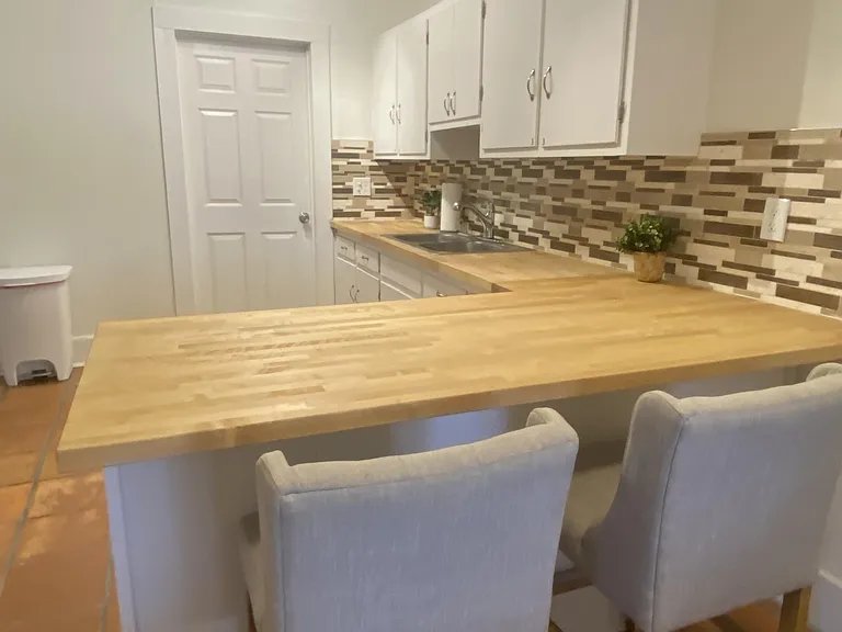 Kitchen with bar top seating