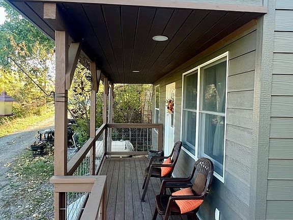 Top unit private deck and front door entrance.