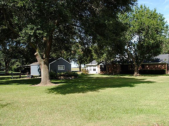 View from backyard.  Here you see the home and back of 2 car garage.