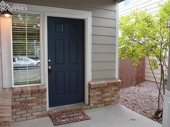 Large front porch area set back for added privacy.