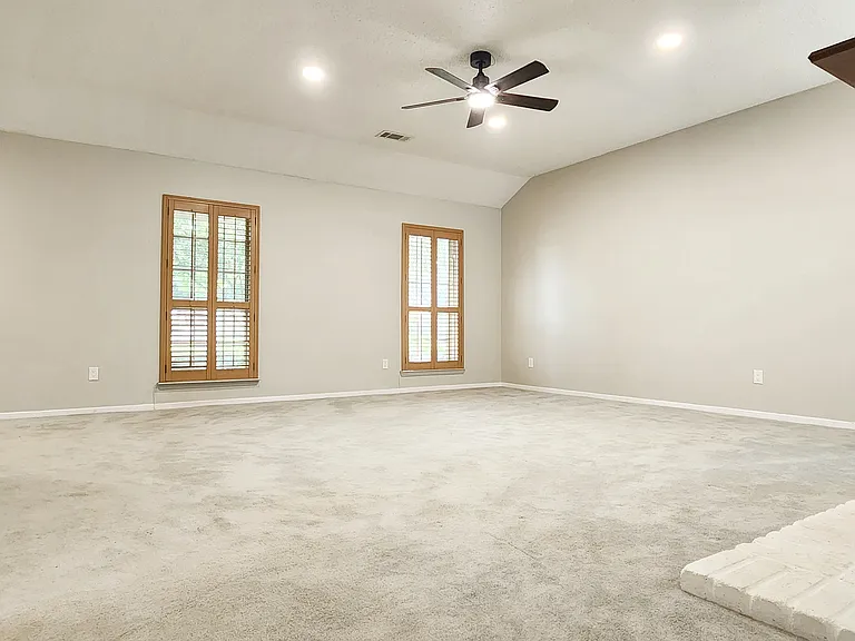 Living room with barn style windows (closed window look)