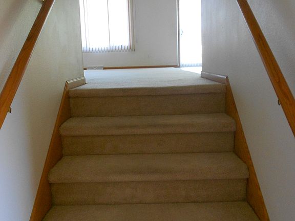 steps from foyer to living space