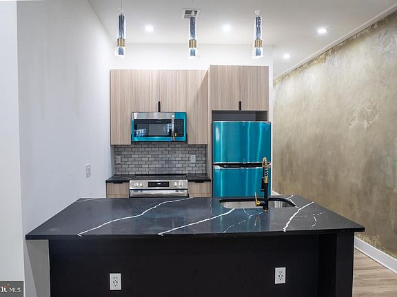 4th image of 55 W Seymour St