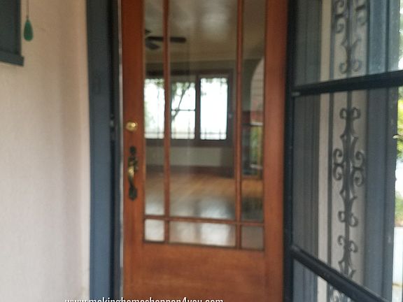 1912 Hazel looking into front door