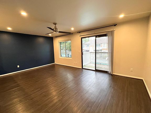 Large and Bright Living/Dining overlooking the pool