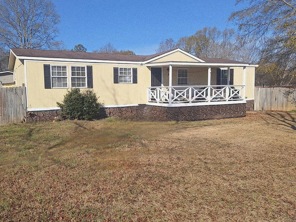 Fully upgraded 3 bedroom, 3 bath home with covered front porch & back deck