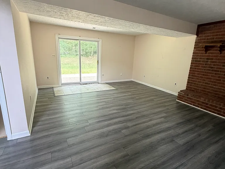 Basement with patio door leading