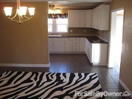 DINING ROOM : OPENS TO KITCHEN & SUNROOM
