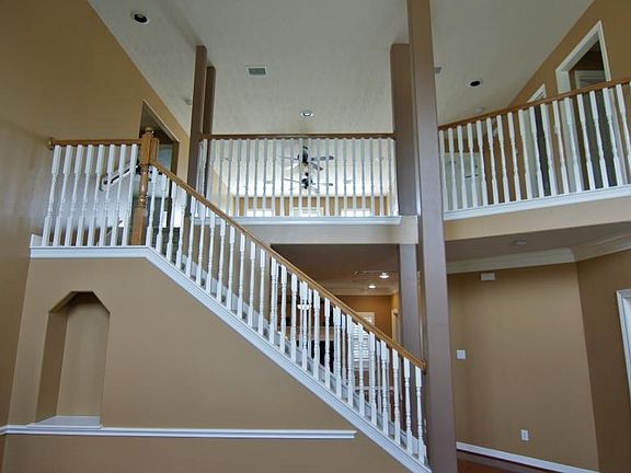 Entire interior and exterior of home recently painted. Soaring ceilings offers tons of space in this