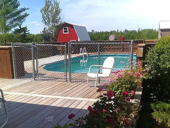 Fenced in pool and decks