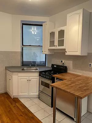 3rd image of 323 E 8th St APT 3C