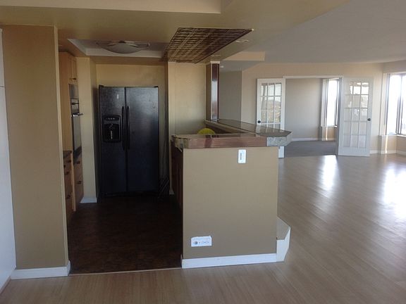 gallery kitchen and huge front room