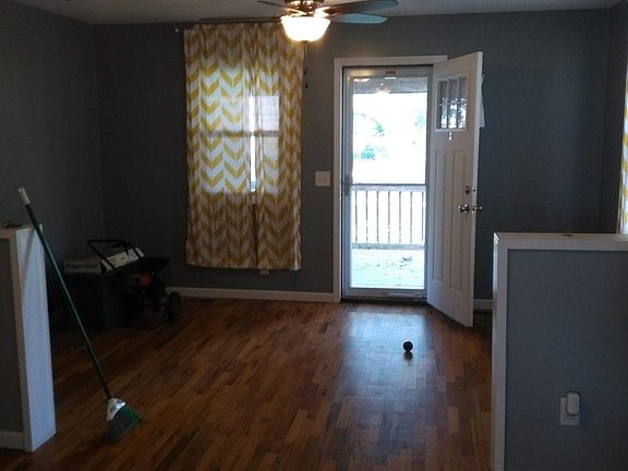 Living room with original hardwood floors.