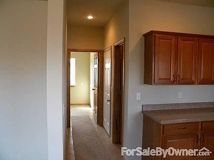 Hall from kitchen
						:
						Pantry, entry from garage and laundry room