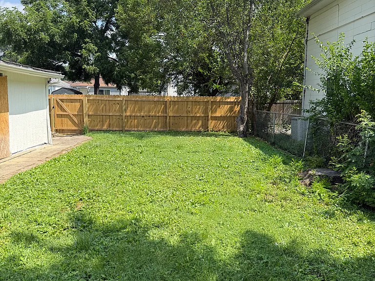 flat fenced yard