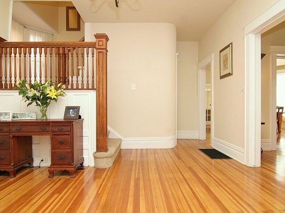 large, open entry, original woodwork