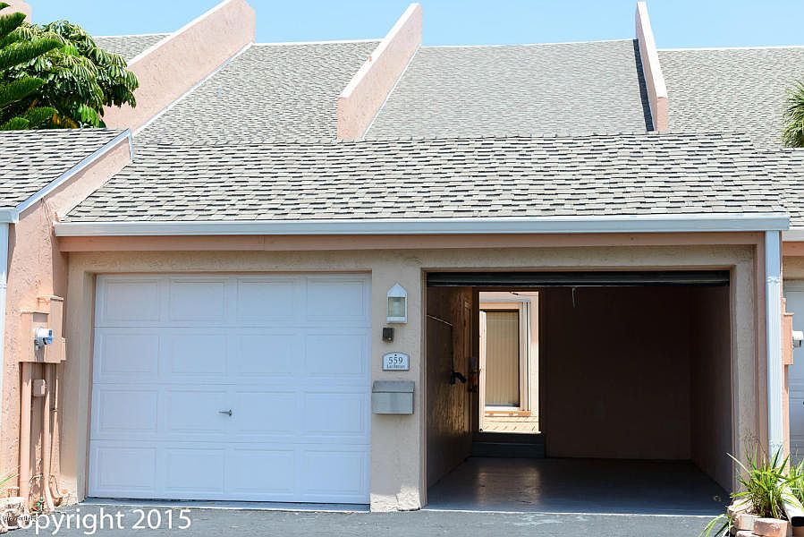 2 Single Garages + 1 Space