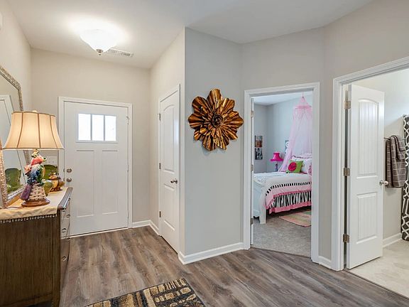 Stock Photo Entryway Foyer - Two Bedrooms up front w a full bath separating them