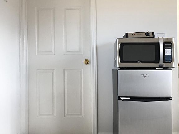 Mini fridge microwave and hot plate included 