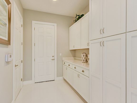 Laundry room with cabinet space