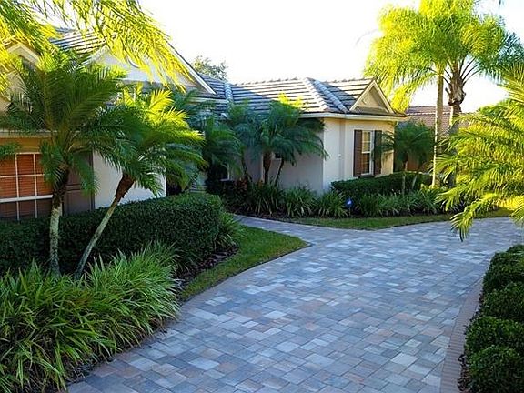 Lush tropical foliage welcomes you home