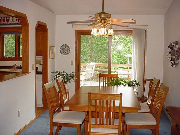 open floorplan with door to huge cedar deck