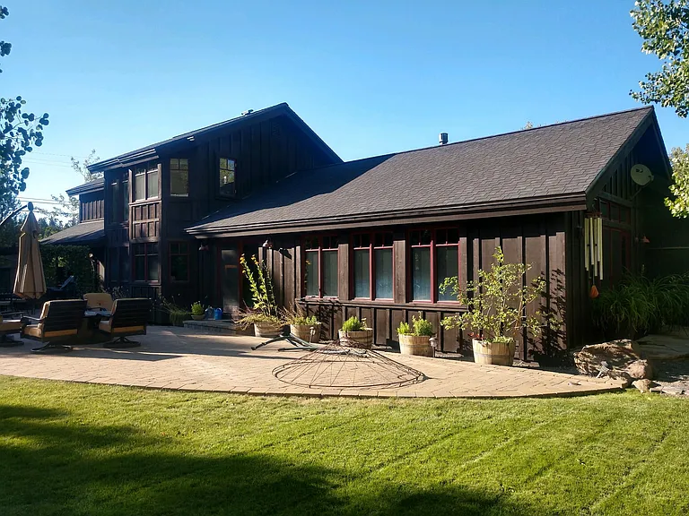 Backyard has plenty of room for games or lounging at the gas firepit