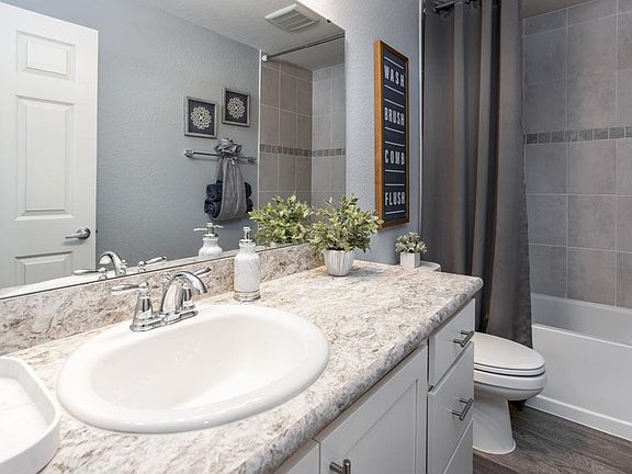 Hall Bath - New home for sale in Haines City, FL. Photo showcases a home with similar finishes. Colo