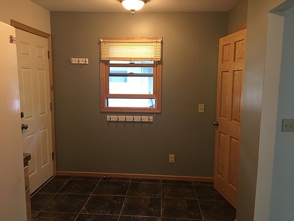 mud room with closet and access to attached garage