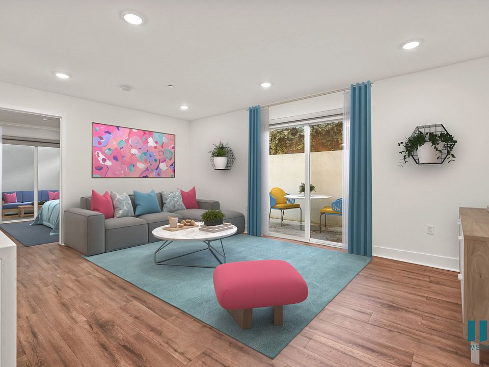 Living Room with Vinyl Flooring, Recessed Lighting, and Patio